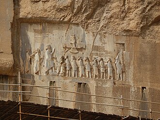 Behistun Inscription — carved on a cliff in Iran by Darius I, written in three languages.